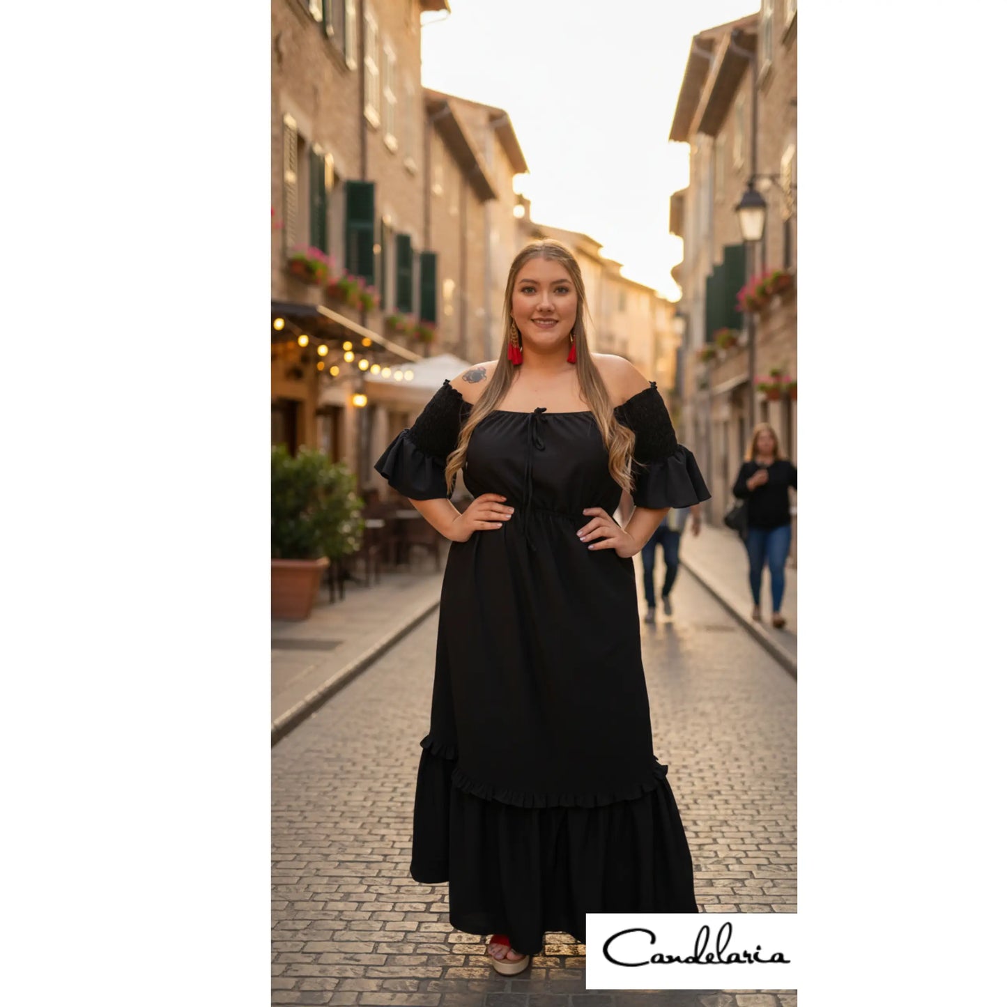 Vestido maxi con boleros y resorte en mangas.