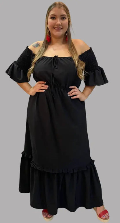 Vestido maxi con boleros y resorte en mangas.