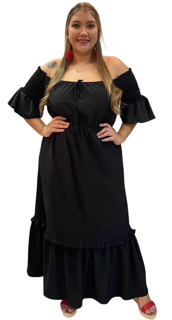 Vestido maxi con boleros y resorte en mangas.